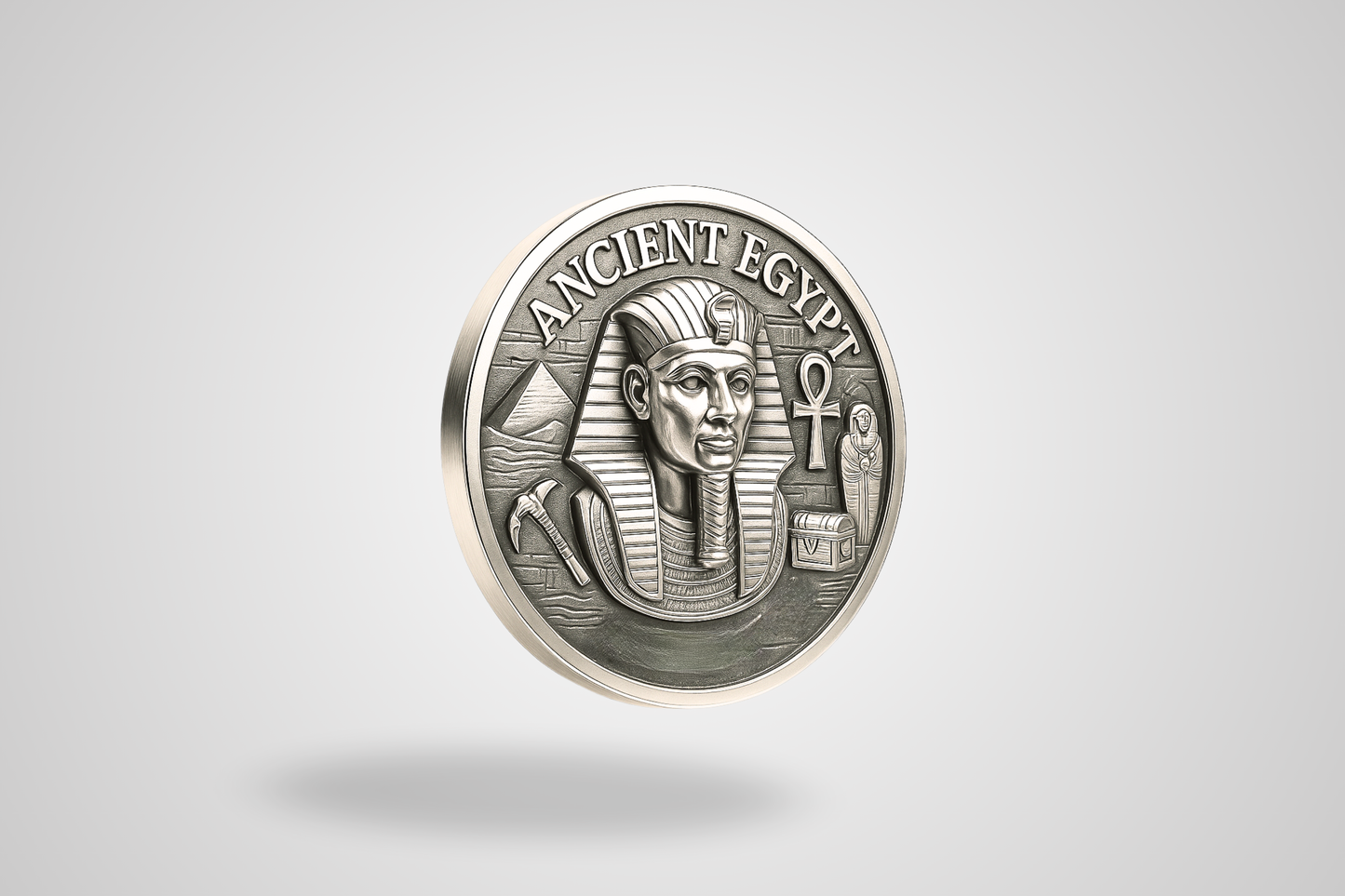 A photo of a silver metal token with 3D effect