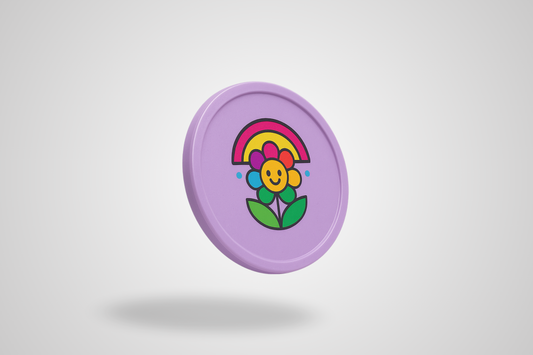 A photo of a pink plastic token with full-color print