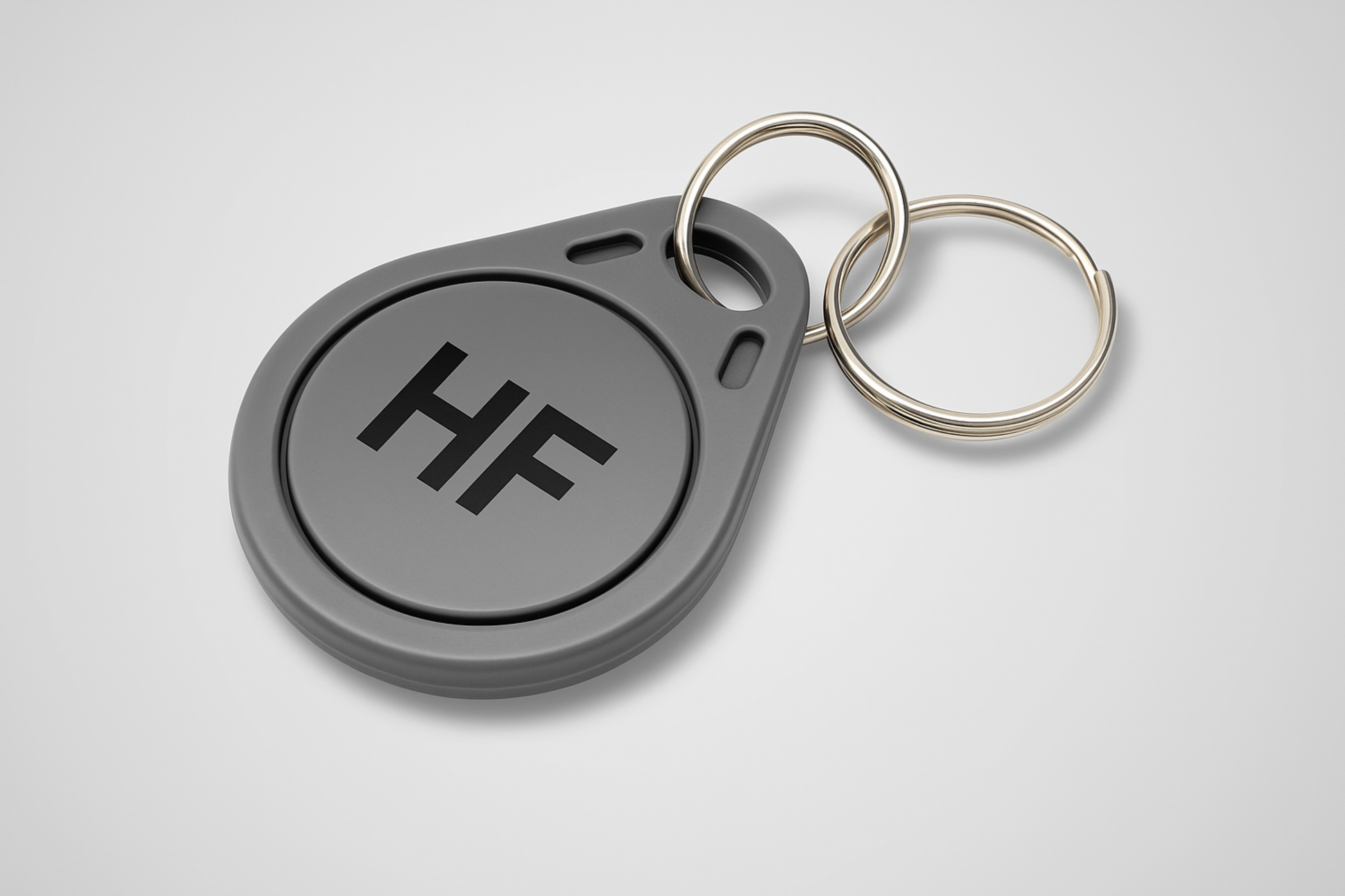 A photo of a gray high frequency key fob