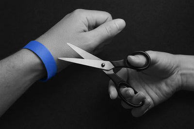 How do you get festival wristbands off?