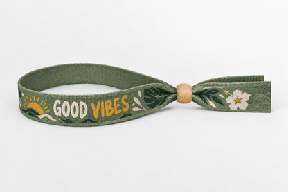 Green bamboo fabric wristband with Good Vibes print and wooden lock