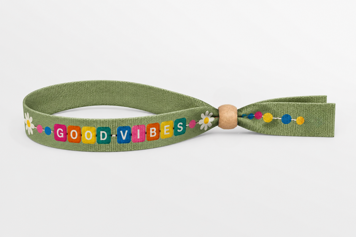 Green cotton wristband with colourful Good Vibes print