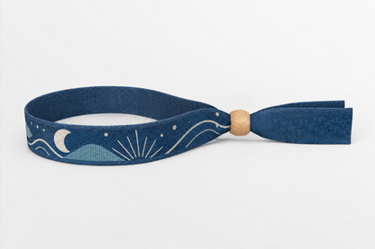 Navy cotton wristband with printed moon and wave design