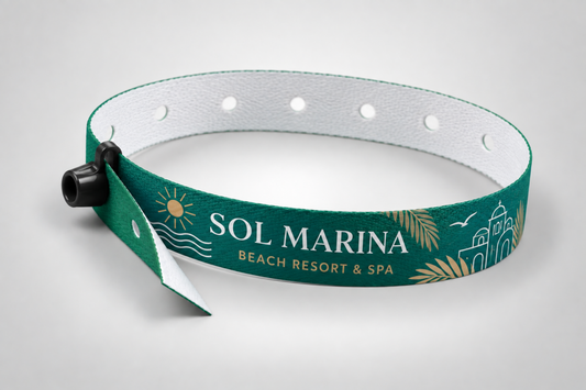 Green fabric wristband with snap lock and printed resort logo