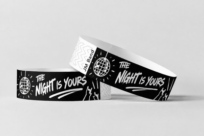 Two black paper wristbands with white party night print
