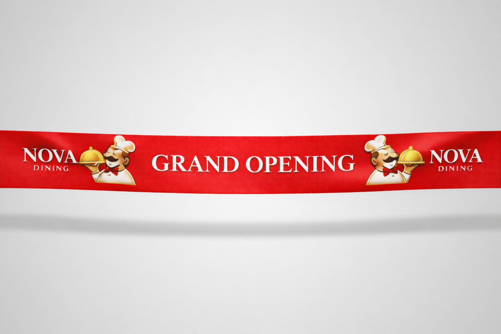 Red inauguration ribbon with custom color print from JM Band®.