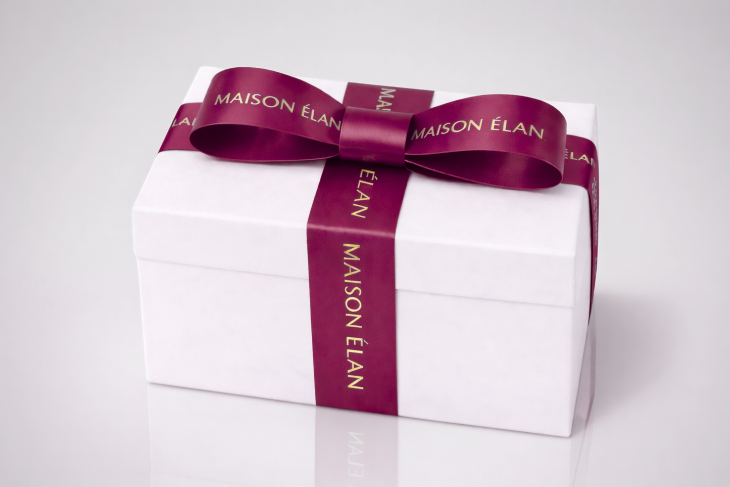 Wide printed gift ribbon in dark red from JM Band®.