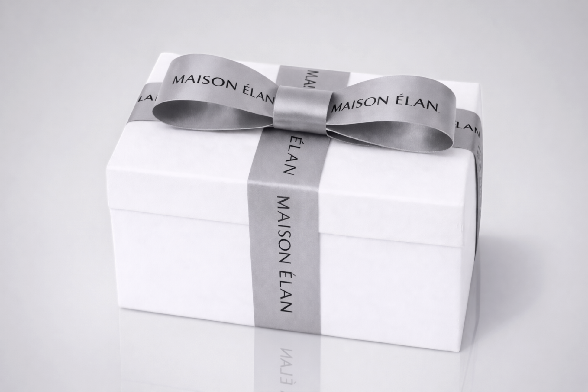 Wide gray gift ribbon with print from JM Band®.