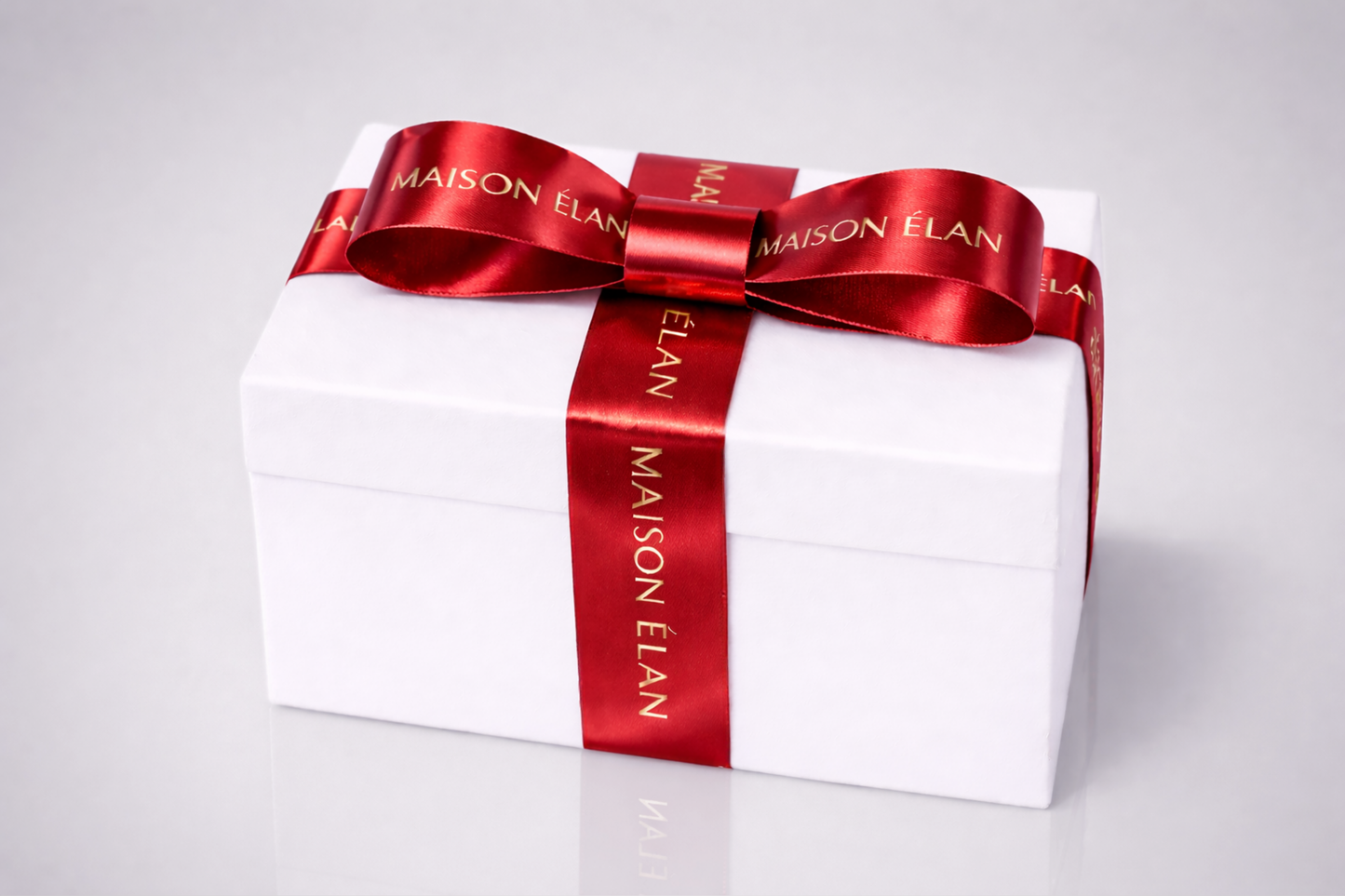 Wide gift ribbon with print in metallic red from JM Band®.