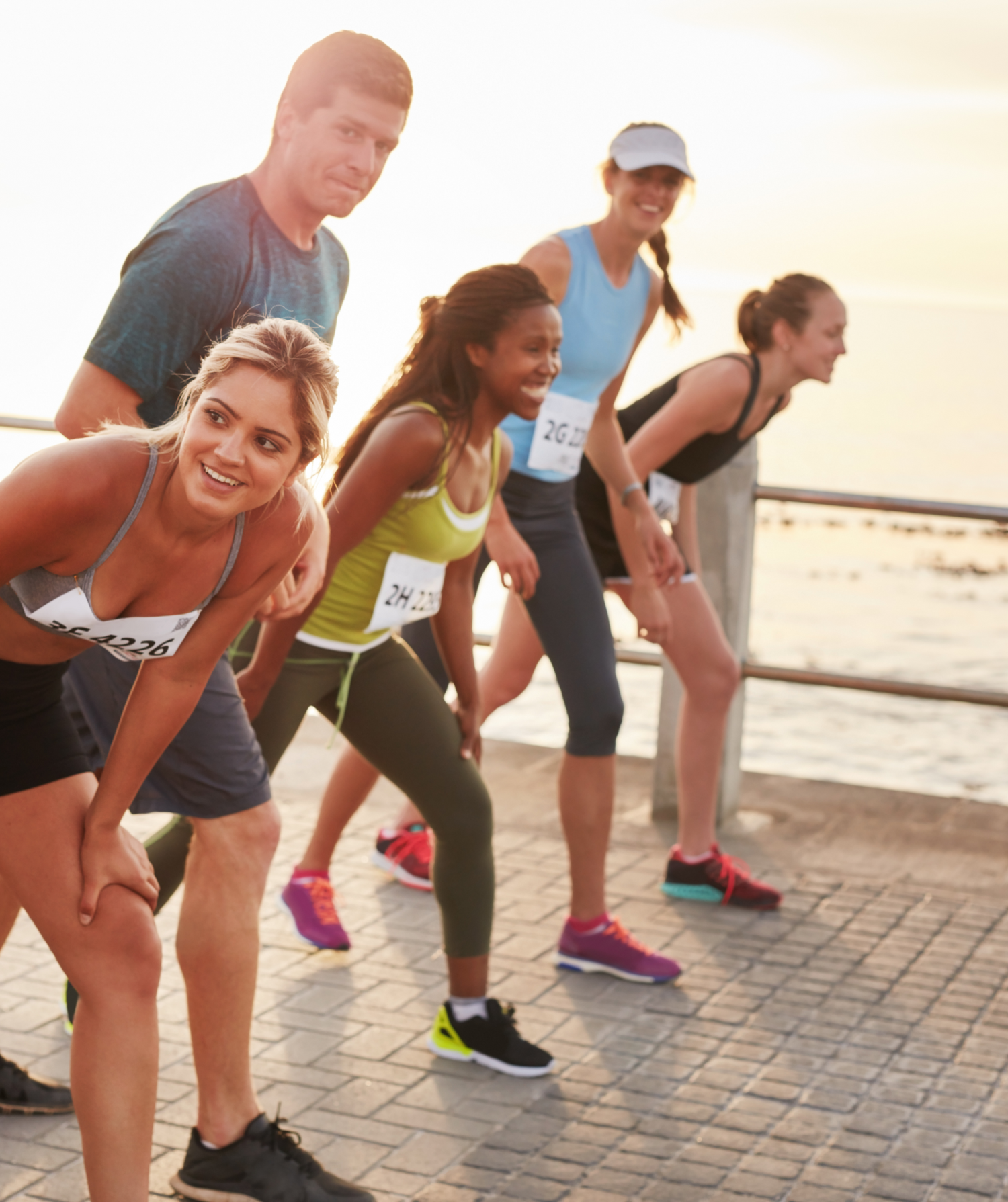 diverse group of people running